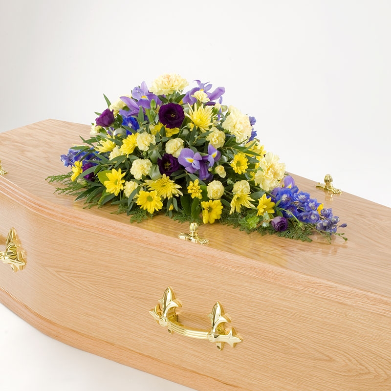 Yellow and blue Funeral Spray